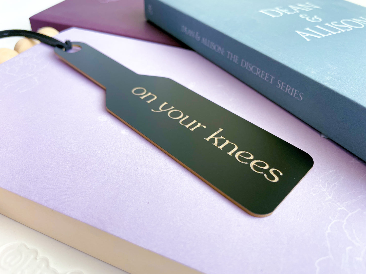 On Your Knees - Black Paddle Bookmark