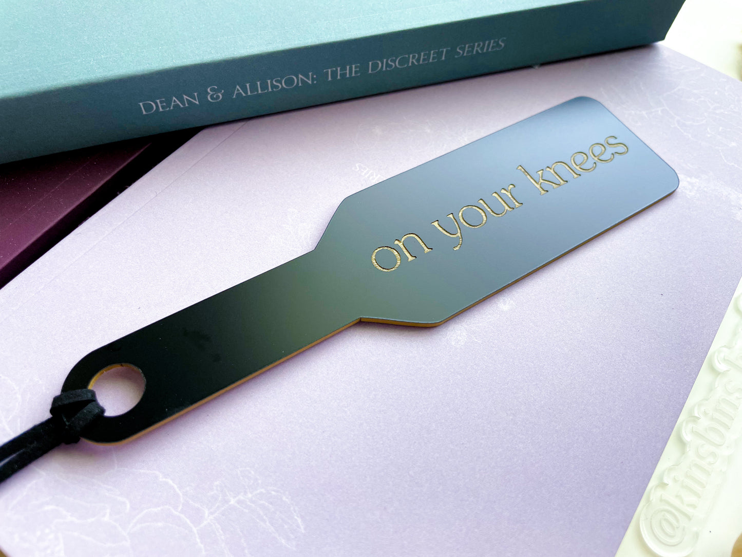 On Your Knees - Black Paddle Bookmark